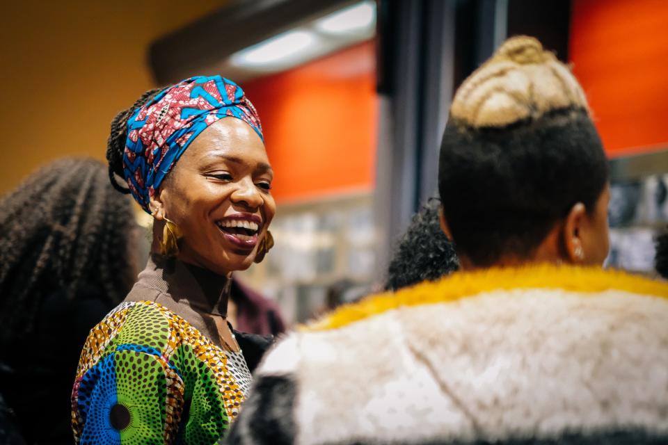 A movie-goer with a headscarf