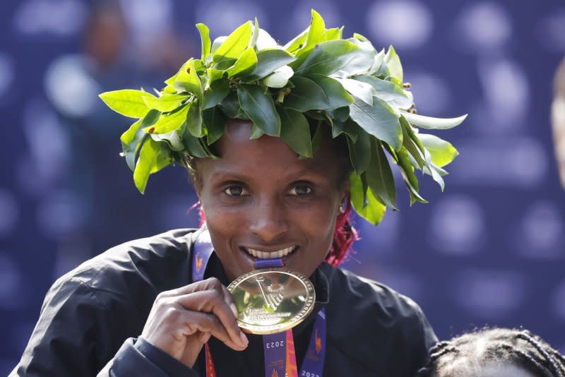 Hellen Obiri of Kenya celebrates Sunday after winning the women's race at the 2023 New York Marathon. Photo by John Angelillo/UPI