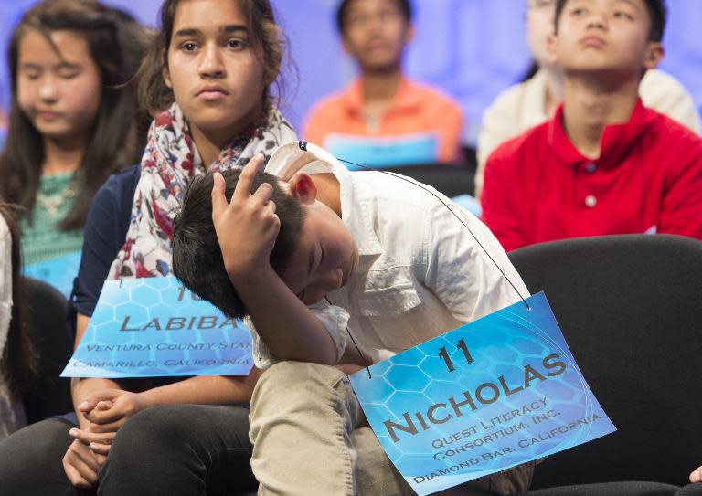 Nicholas Lee of Rancho Cucamonga, California, waits onstage following his turn during the 3rd round of the 88th Annual Scripps National Spelling Bee at National Harbor, Maryland, May 27, 2015