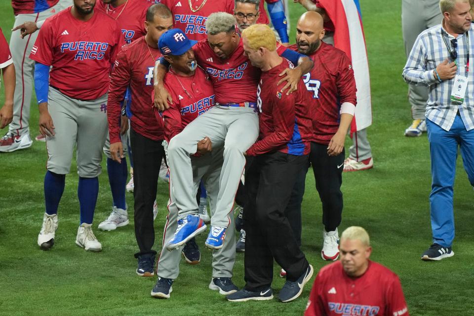 Edwin Diaz was unable to put any weight on his right leg after being injured in a celebration of Puerto Rico's 5-2 win over the Dominican Republic in the World Baseball Classic.