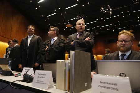 Attorneys prepare before the start of a hearing over the VW diesel emissions cheating scandal, in Braunschweig