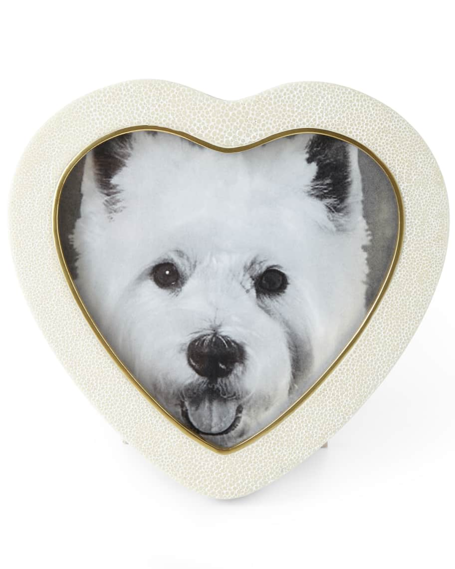 <p><a href="https://go.redirectingat.com?id=74968X1596630&url=https%3A%2F%2Fwww.neimanmarcus.com%2Fp%2Faerin-cream-faux-shagreen-heart-picture-frame-prod183020578&sref=https%3A%2F%2Fwww.veranda.com%2Fluxury-lifestyle%2Fg30718234%2Fvalentines-day-gift-ideas%2F" rel="nofollow noopener" target="_blank" data-ylk="slk:Shop Now;elm:context_link;itc:0;sec:content-canvas" class="link rapid-noclick-resp">Shop Now</a></p><p>AERIN Cream Faux-Shagreen Heart Picture Frame</p><p>https://www.neimanmarcus.com</p><p>$350.00</p>