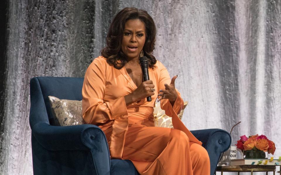 Michelle Obama said the state of US politics had "led to a weight I haven't felt in my life" - WIREIMAGE