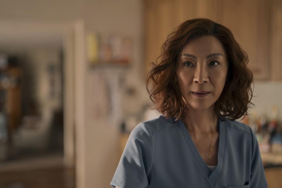 This image released by Netflix shows Michelle Yeoh as Mama Sun in an episode of "The Brothers Sun." (Michael Desmond/Netflix via AP)