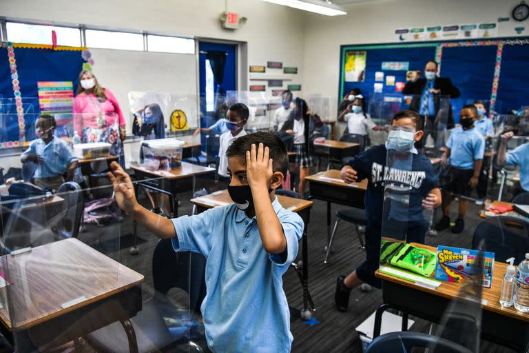 Estudiantes en un aula de Miami. (Photo by CHANDAN KHANNA / AFP)