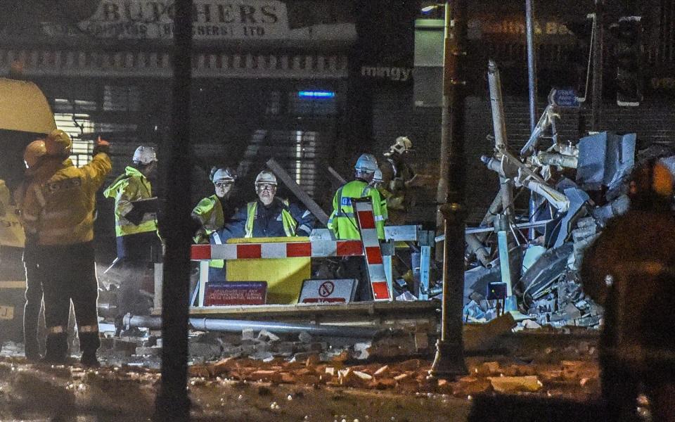 Emergency workers at the scene of the gas blast - Credit:  Iain Watts/Mercury Press