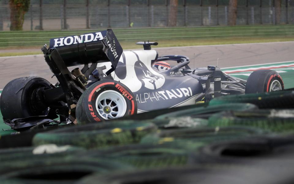 AlphaTauri driver Yuki Tsunoda of Japan crashes his car during qualifying practice for Sunday's Emilia Romagna Formula One Grand Prix, at the Imola track, Italy, Saturday, April 17, 2021. - AP Photo/Luca Bruno