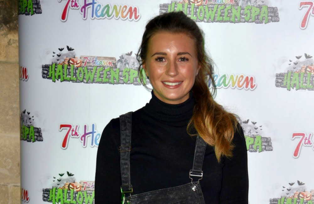 Dani Dyer has joked her 14-month-old son is 'more intelligent' than her credit:Bang Showbiz