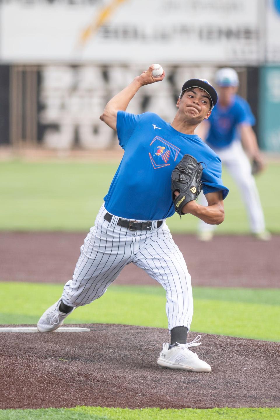 Pueblo Azteca's Frank Flores Jr. winds up on a pitch during a day two game of the 44th annual Tony Andenucio Tournament against the Victus Recruits on Friday, June 14, 2024.