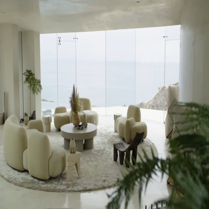 The living room has a huge view of the ocean