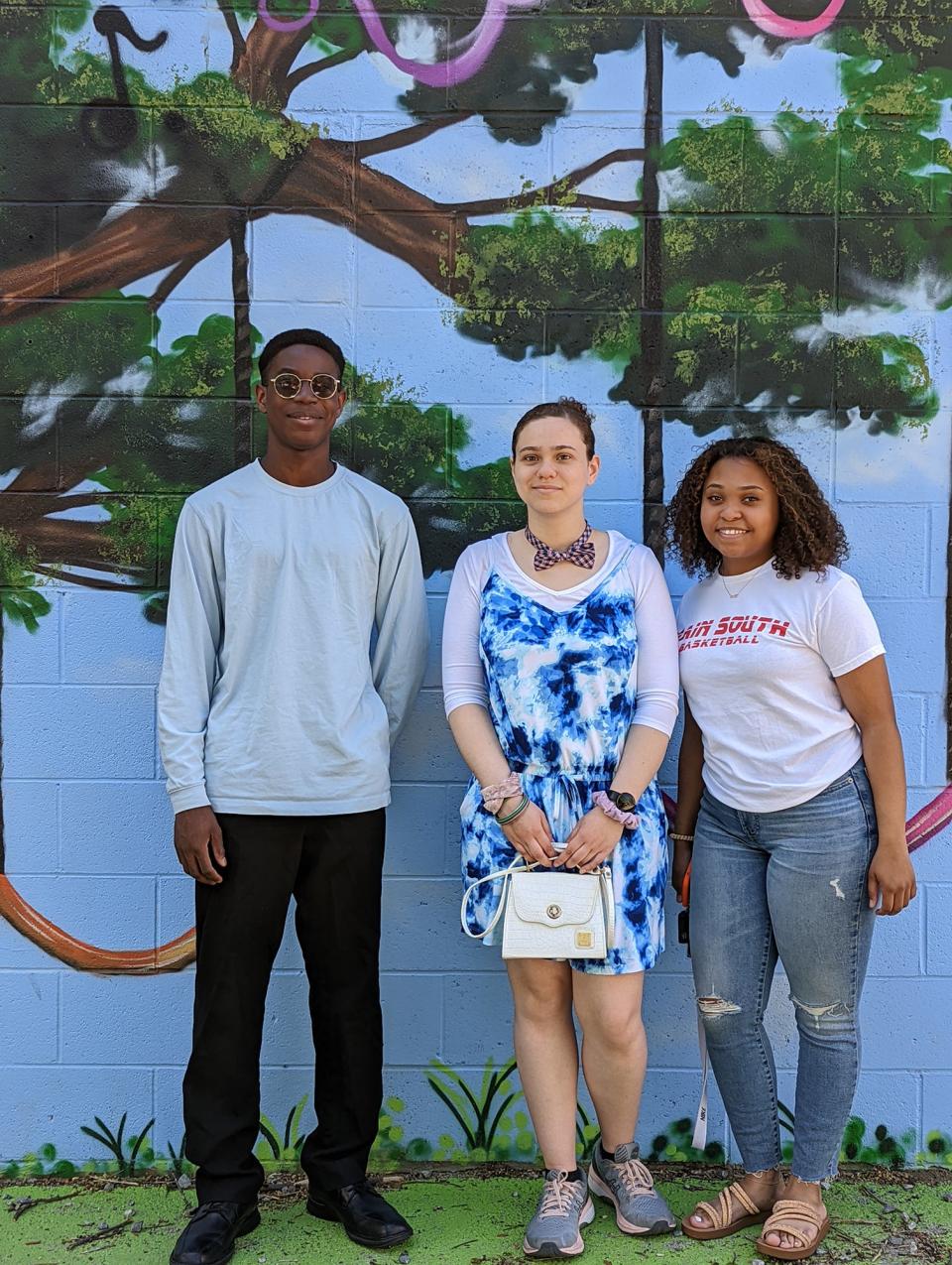 Violist Yann Somasse, violinist Isabella Galindo and violinist Alisa St-Helene are graduating this year and say they hope to continue playing the instruments they learned as part of the Neighborhood Strings program.