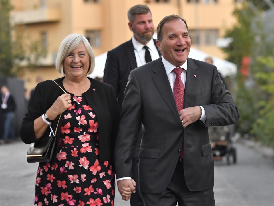 Swedish Prime Minister Stefan Lofven and his wife Ulla Lofven in Stockholm, Sweden, Sunday Sept. 9, 2018. An exit poll indicated that Sweden's first general election since the Scandinavian country accepted a significant number of asylum-seekers was likely to have the center-left party governing now as its winner, but an anti-immigrant party with white supremacist roots placing second in balloting Sunday. (Jonas Ekstromer/TT via AP)