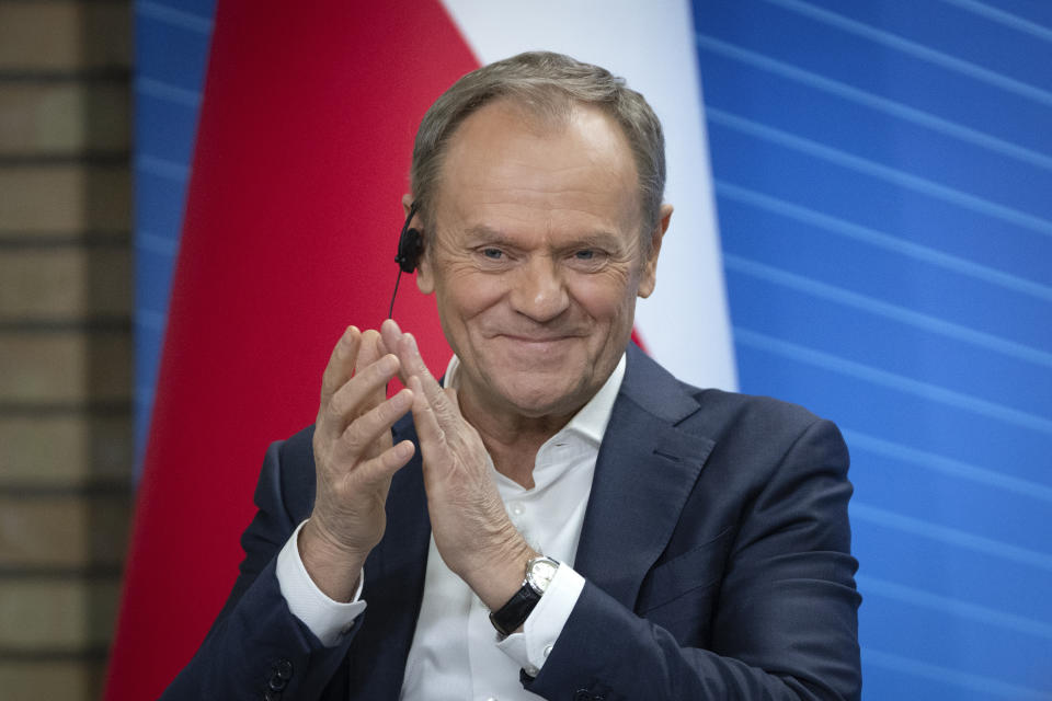 FILE - Poland's Prime Minister Donald Tusk reacts during his and Ukrainian President Volodymyr Zelenskyy meeting with students in Kyiv, Ukraine, Monday, Jan. 22, 2024. Poland's Prime Minister Donald Tusk is celebrating a victory on Monday April 22, 2024 after a series of candidates supported by his party won weekend races for mayor. (AP Photo/Efrem Lukatsky, File)