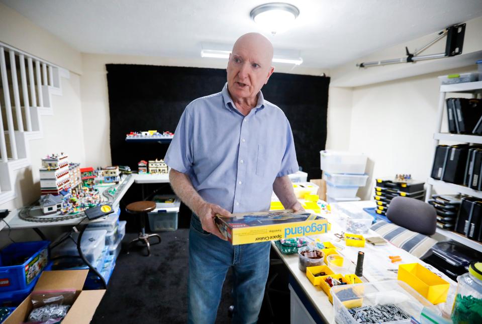 Harold Moody holds the first Lego kit he bought to build with his son, on Tuesday, July 11, 2023.