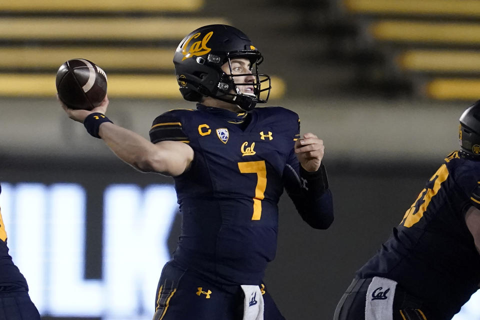 FILE - In this Dec. 5, 2020, file photo, California quarterback Chase Garbers throws a pass against Oregon during the second half of an NCAA college football game in Berkeley, Calif. After a pandemic-shortened 2020 season, the California Golden Bears are excited to show off what they hope will be a much more dynamic offense with respected longtime NFL coordinator Bill Musgrave and veteran quarterback Chase Garbers. (AP Photo/Jeff Chiu, File)