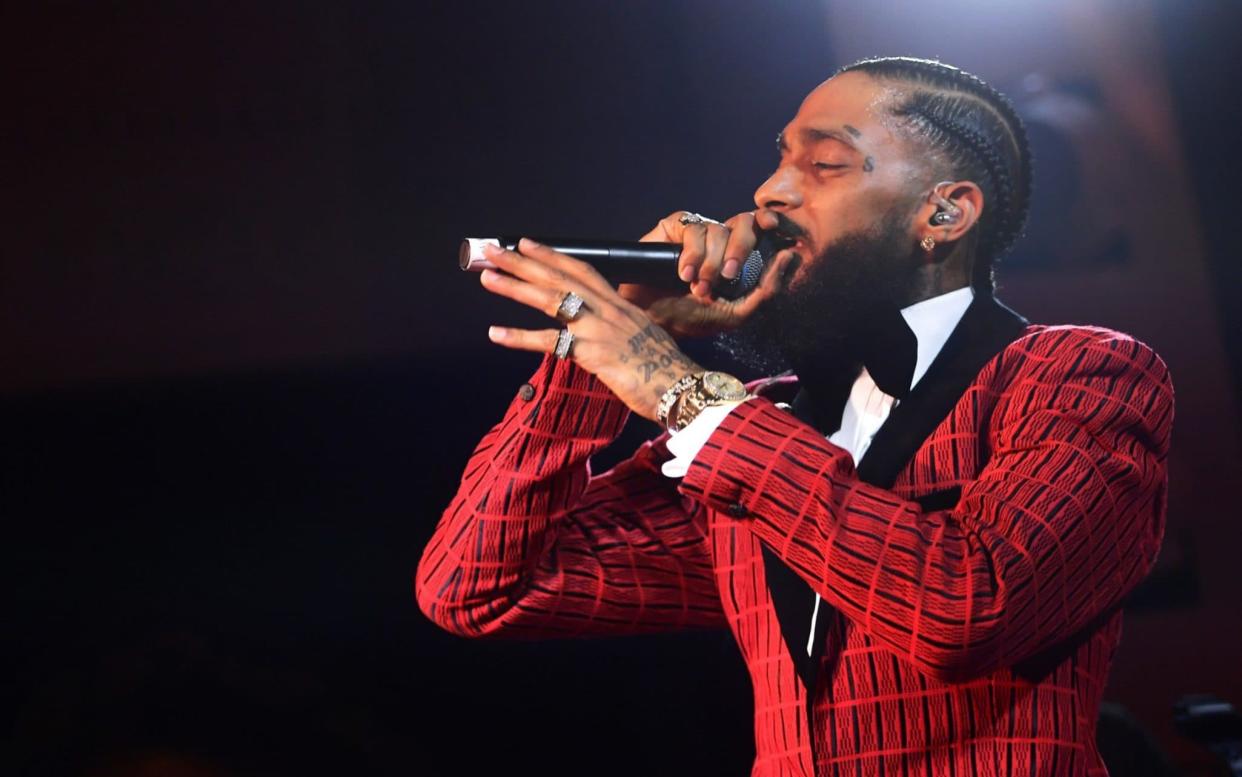 Rapper Nipsey Hussle was shot multiple times outside his Hyde Park store in Los Angeles - Getty Images North America