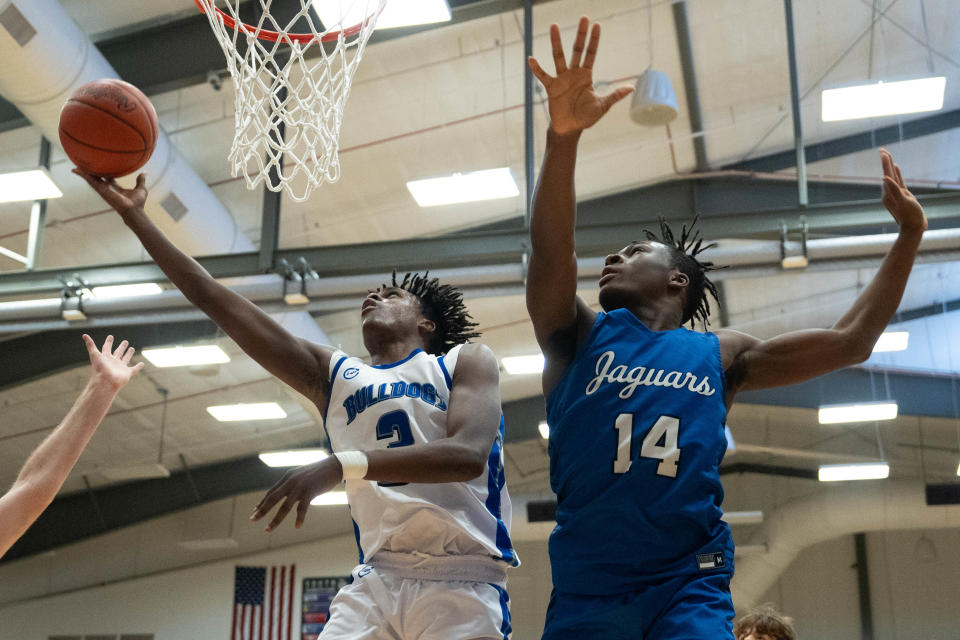 South's Carmelo McDonald goes up for a layup against Hilliard Bradley's Jordan Reed-Davis during their game on Jan. 6. Bradley is the No. 5 seed in Division I, and South is the No. 9 seed.