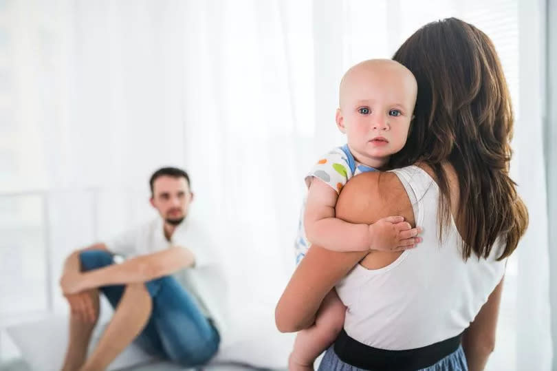 Woman holding baby