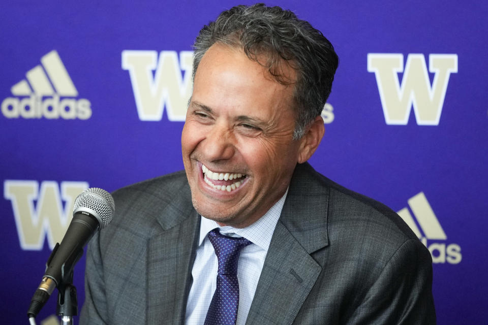 New Washington head coach Jedd Fisch laughs during an NCAA college football press conference to introduce him to the community, Tuesday, Jan. 16, 2024, in Seattle. (AP Photo/Lindsey Wasson)