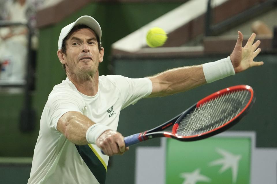 Andy Murray, of Britain, returns a shot to Jack Draper, of Britain, at the BNP Paribas Open tennis tournament Monday, March 13, 2023, in Indian Wells, Calif. (AP Photo/Mark J. Terrill)