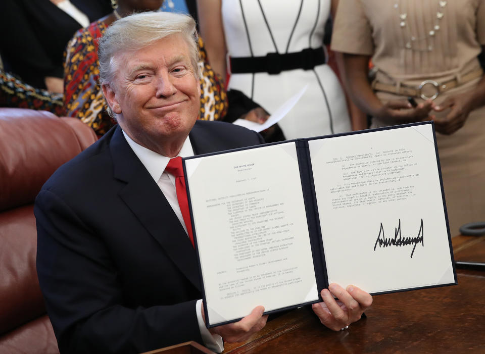 WASHINGTON, DC - FEBRUARY 07:  U.S. President Donald Trump displays a signed National Security Presidential Memorandum in the Oval Office February 7, 2019 in Washington, DC. The memorandum launches a Trump administration goal, the “Women’s Global Development and Prosperity” Initiative, an initiative led by his daughter, Ivanka Trump. (Photo by Win McNamee/Getty Images)