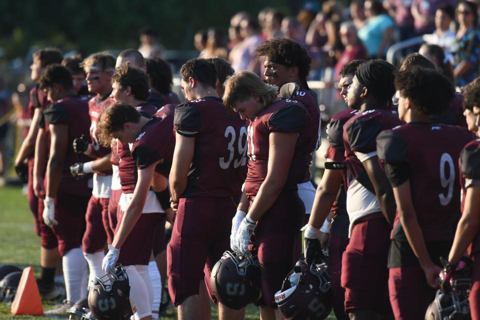 Shippensburg stands for the alma mater before its game against Cedar Cliff on August 25, 2023. The Colts defeated the Greyhounds 29-13.