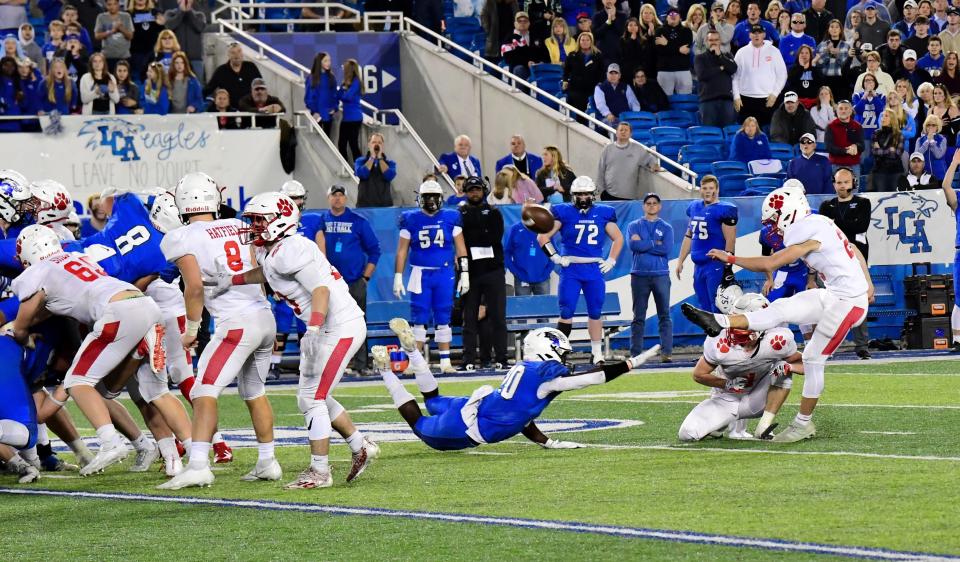 Jake Conrad (20) lifts the game-winning field goal for Beechwood at the 2021 KHSAA Class 2A state football championship, Dec. 3, 2021.