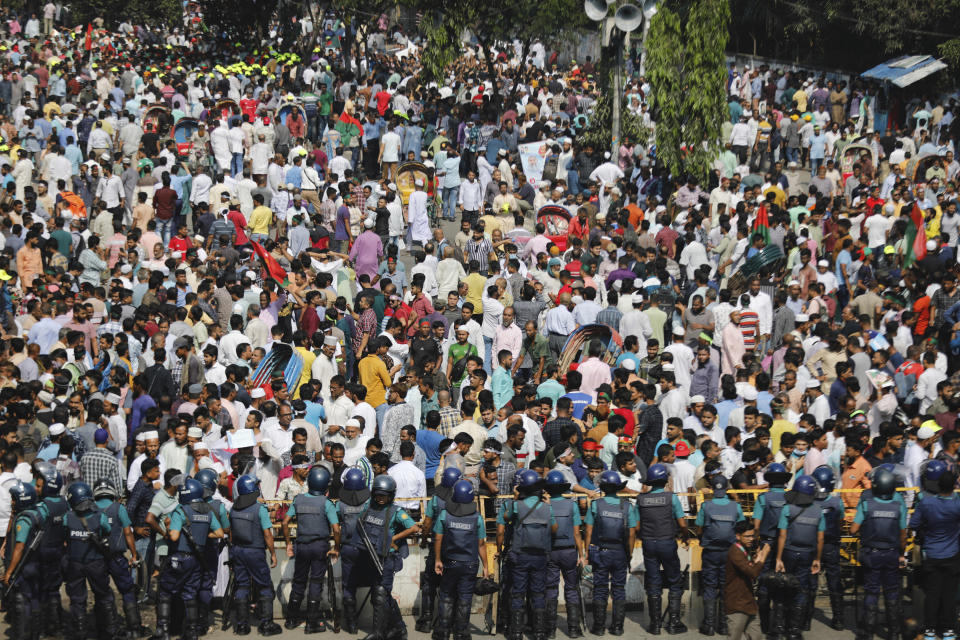 Activists of the Bangladesh Nationalist Party gather for a protest in Dhaka, Bangladesh, Saturday, Oct. 28, 2023. Police in Bangladesh's capital fired tear gas to disperse supporters of the main opposition party who threw stones at security officials during a rally demanding the resignation of Prime Minister Sheikh Hasina and the transfer of power to a non-partisan caretaker government to oversee general elections next year. (AP Photo/Mahmud Hossain Opu)