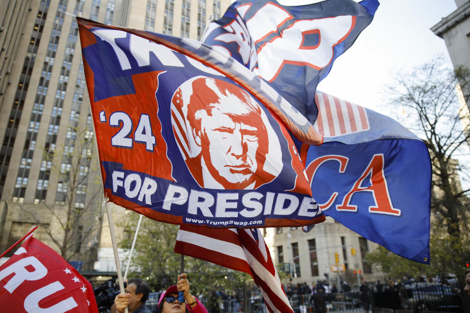 Supporters of former President Donald Trump demonstrate outside Manhattan criminal court, Monday, April 15, 2024, in New York. The hush money trial of Trump begins Monday with jury selection. It's a singular moment for American history as the first criminal trial of a former U.S. commander in chief. (AP Photo/Stefan Jeremiah)