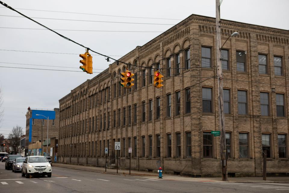 Urban Restorations received a $3.2 million state tax credit the company needed to start renovations of the Essex building at the corner of North Columbus and Mulberry streets.