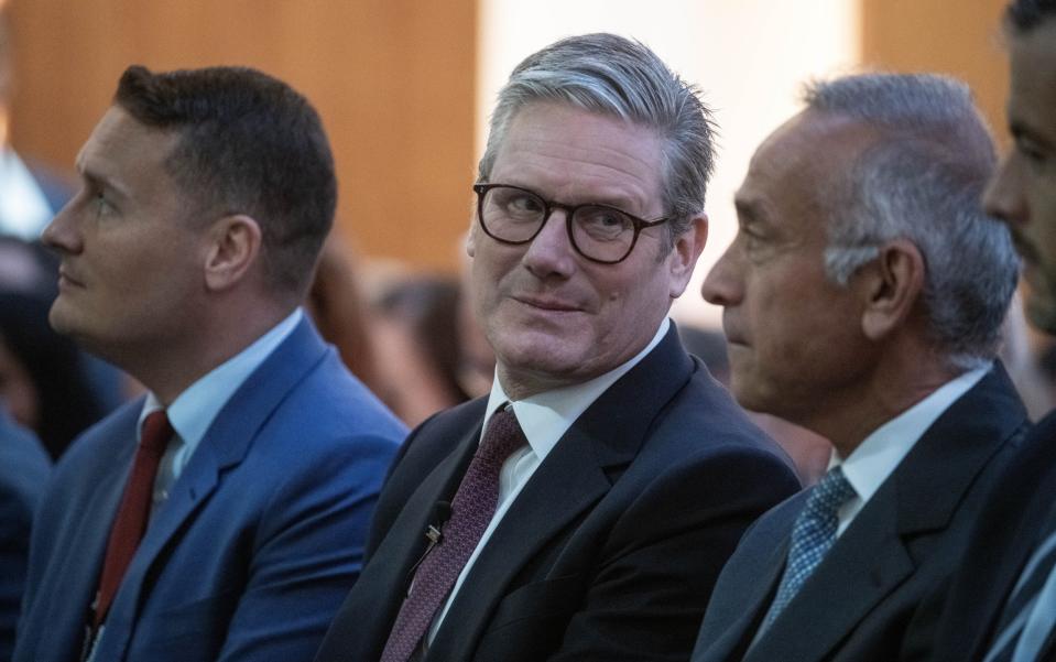 Wes Streeting, left, Sir Keir Starmer and Lord Darzi before the Prime Minister's speech to the King's Fund