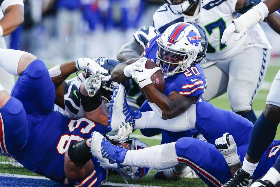 Buffalo Bills' Zack Moss (20) rushes for a touchdown during the second half of an NFL football game against the Seattle Seahawks, Sunday, Nov. 8, 2020, in Orchard Park, N.Y. (AP Photo/John Munson)