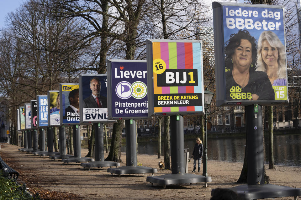 Election billboards are seen near the parliament building in The Hague, Netherlands, Monday, Nov. 20, 2023. Dutch voters will go to the polls on Wednesday Nov. 22, 2023. (AP Photo/Peter Dejong)