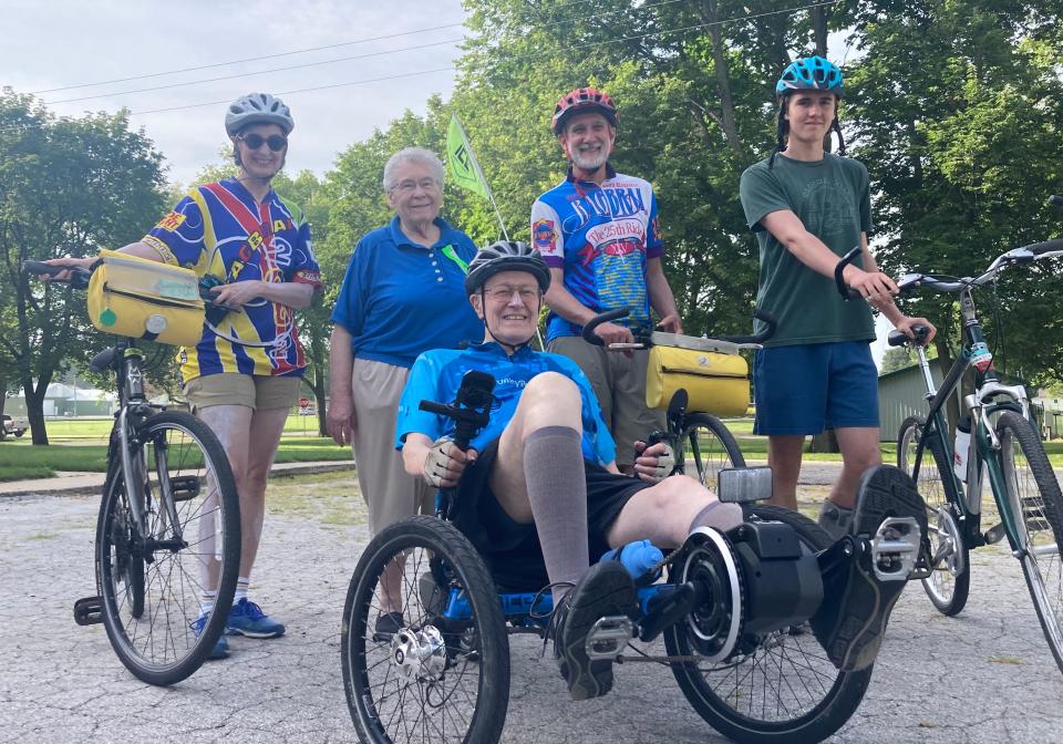 From left rear, Charlotte and Nancy Hopkins and William Grace and his son Avery, 15, get ready to ride the 50th RAGBRAI with Jim Hopkins, center.