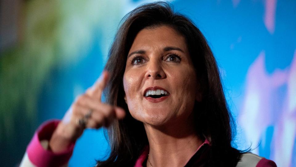 PHOTO: Republican presidential candidate Nikki Haley speaks with supporters at Doc's Barbecue during a campaign stop in Columbia, S.C., on Feb. 1, 2024.  (Jim Watson/AFP via Getty Images)