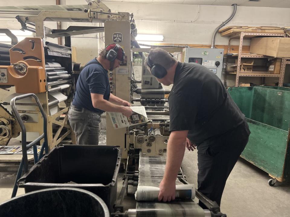 Papers being printed at the Whitehorse Star newspaper office in Whitehorse.