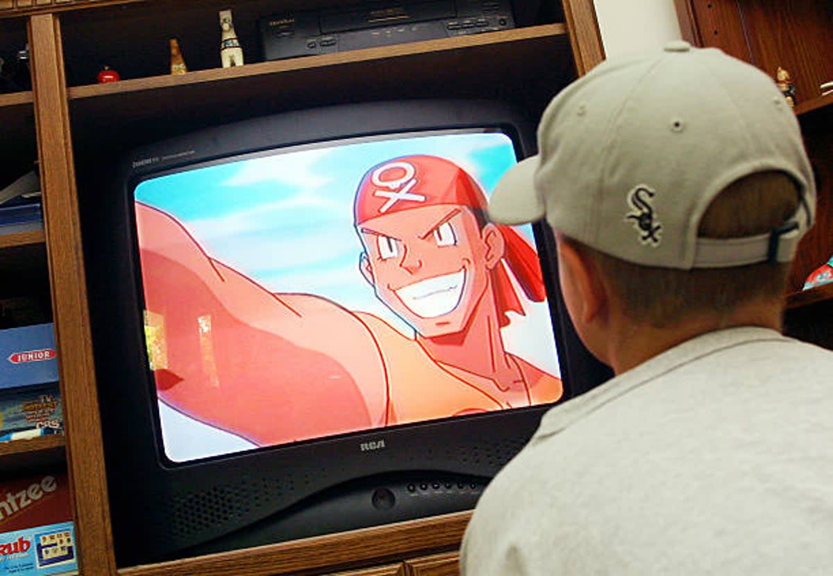 Representational image: A young boy watches a Pokemon video in his home (Getty Images)