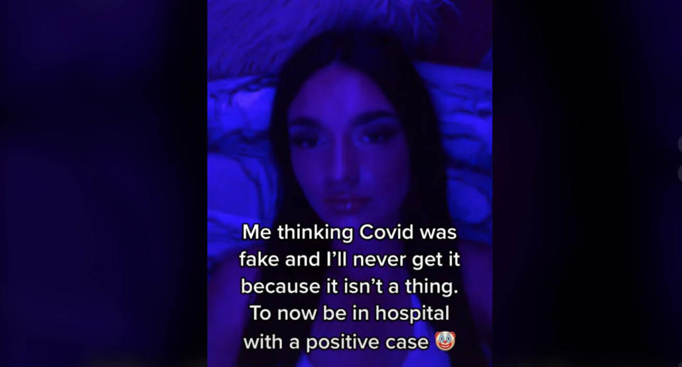 A screenshot of a TikTok video in which a young woman who thought Covid was fake reveals she has tested positive to the virus.Source: TikTok/yxdad