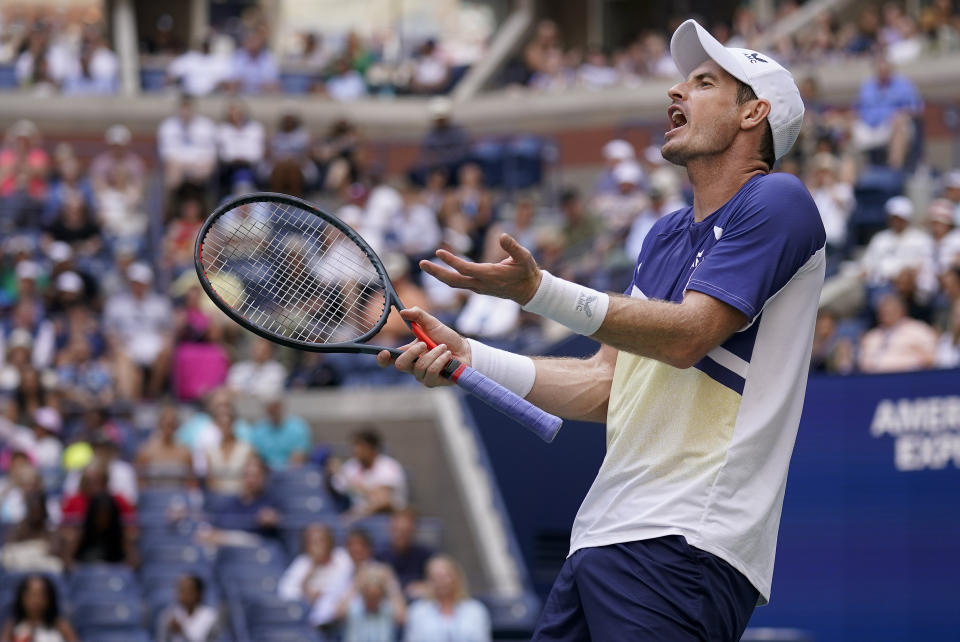 Andy Murray, of Great Britain, reacts during a match against Matteo Berrettini, of Italy, during the third round of the U.S. Open tennis championships, Friday, Sept. 2, 2022, in New York. (AP Photo/Seth Wenig)