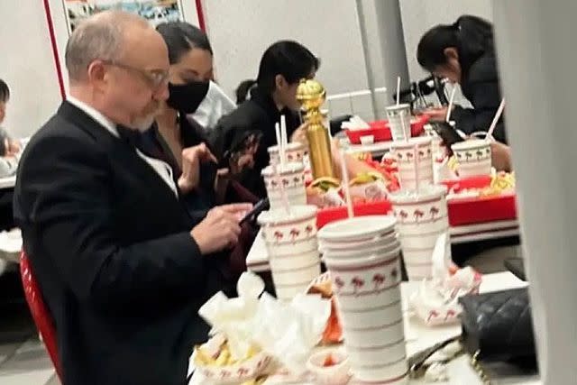 <p>Michael Warburton/ X</p> Paul Giamatti's viral In-N-Out photo.