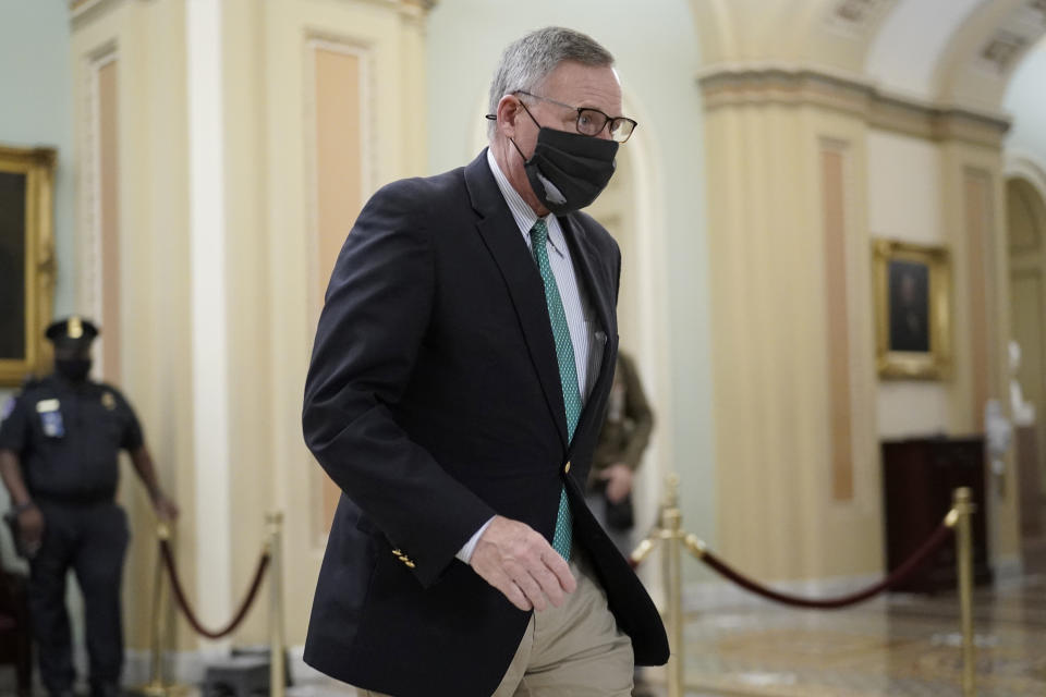 Sen. Richard Burr, R-N.C., walks in the Capitol as the Senate proceeds in a rare weekend session for final arguments in the second impeachment trial of former President Donald Trump, at the Capitol in Washington, Saturday, Feb. 13, 2021. (AP Photo/J. Scott Applewhite)