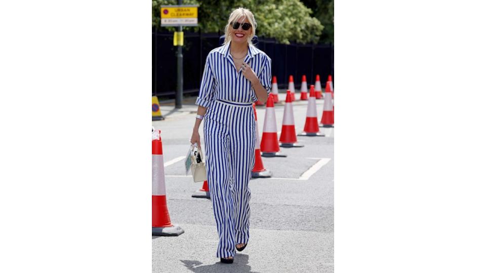 Sienna Miller  attends Wimbledon Championships Tennis Tournament Day 7 at All England Lawn Tennis and Croquet Club on July 05, 2021 in London, England. (Photo by Neil Mockford/GC Images)