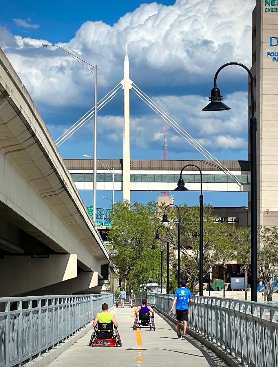 People using the Fuller Warren SUP (shared-use path) on Sunday.