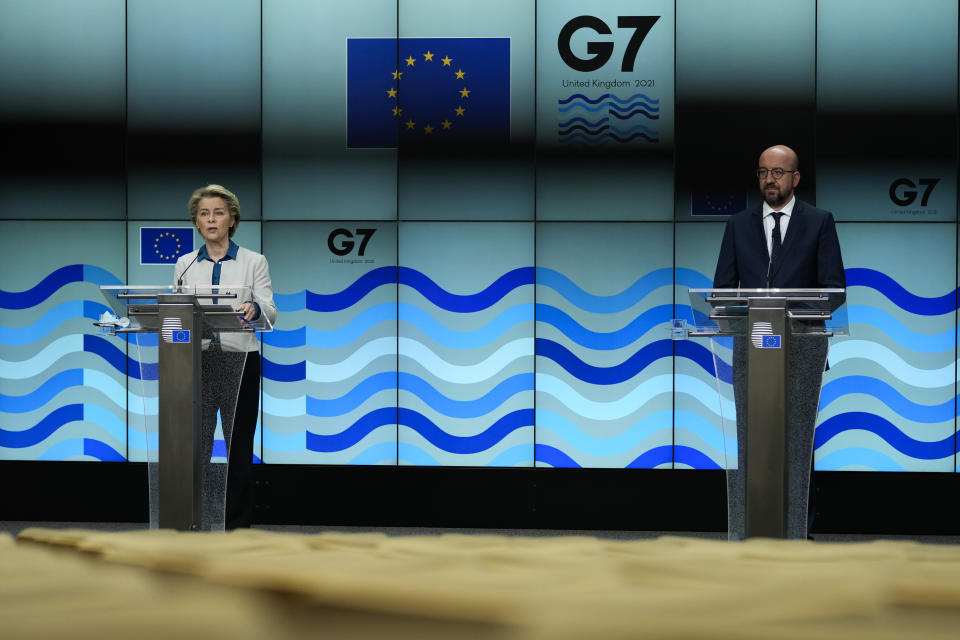 European Commission President Ursula von der Leyen, left, speaks during a joint news conference with European Council President Charles Michel ahead of the G7 summit, at the EU headquarters in Brussels, Thursday, June 10, 2021. Charles Michel and Ursula von der Leyen will attend the G7 summit in Cornwall, southwest England. (AP Photo/Francisco Seco, Pool)