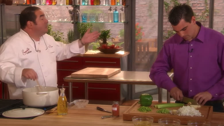 Emeril stirs a roux on set