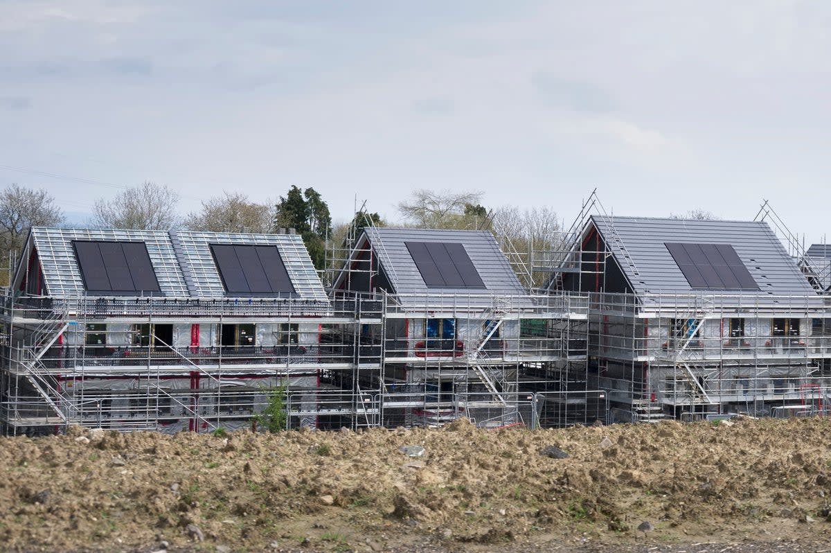 Solar panels being fitted onto new houses in Scotland (Getty Images/iStockphoto)