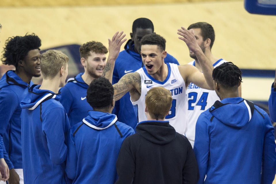 Creighton's Christian Bishop pumps up his team before they take on Kennesaw State in an NCAA college basketball game in Omaha, Neb., Friday, Dec. 4, 2020. (AP Photo/Kayla Wolf)