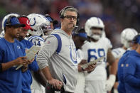 Indianapolis Colts head coach Frank Reich, center, watches from the sidelines during the second half of an NFL football game against the Houston Texans, Sunday, Dec. 5, 2021, in Houston. (AP Photo/Eric Christian Smith)