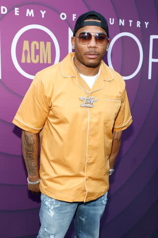 <p>Jason Kempin/Getty</p> Nelly attends the ACM Honors in August 2023 in Nashville