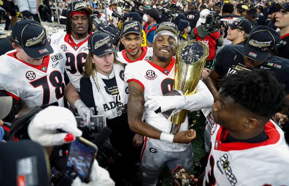 The Georgia Bulldogs celebrate after defeating the Alabama Crimson Tide to win the College Football Playoff National Championship on Monday, Jan. 10, 2022, at Lucas Oil Stadium in Indianapolis. 